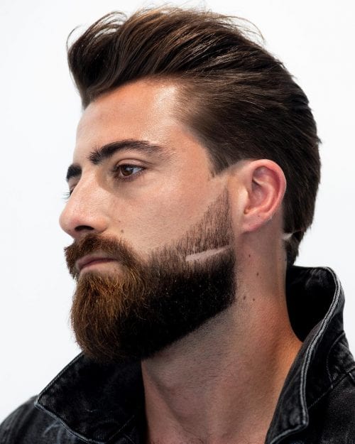Pompadour z pełną ciemną brodą Klasyczny pompadour z fade i długą pełną brodą